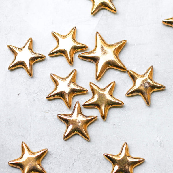 Gold star porcelain magnets by apricity ceramics