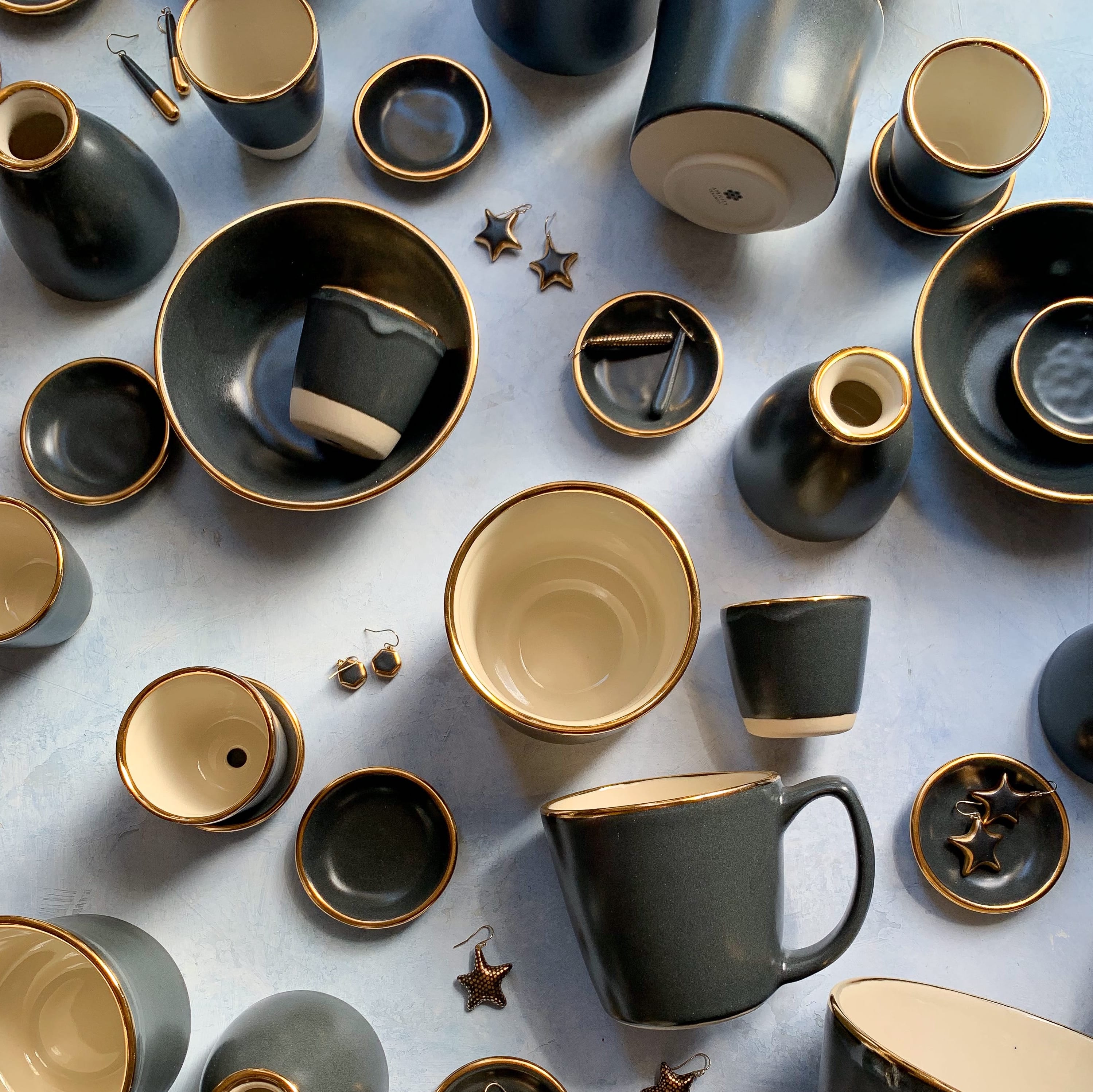 A group of different ceramic items from the smokey charcoal collection