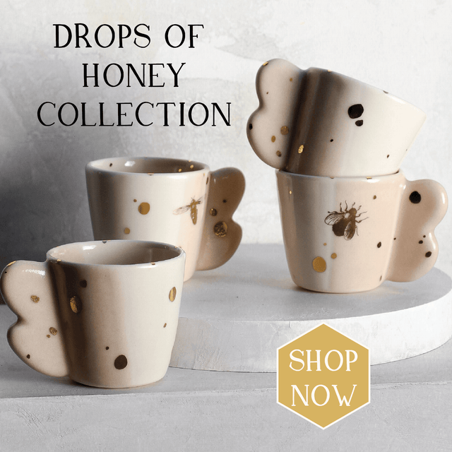 Shop the 'Drops of Honey Bee Collection' featuring espresso cups with a two tones honey glaze and 22k gold "drops" of honey.