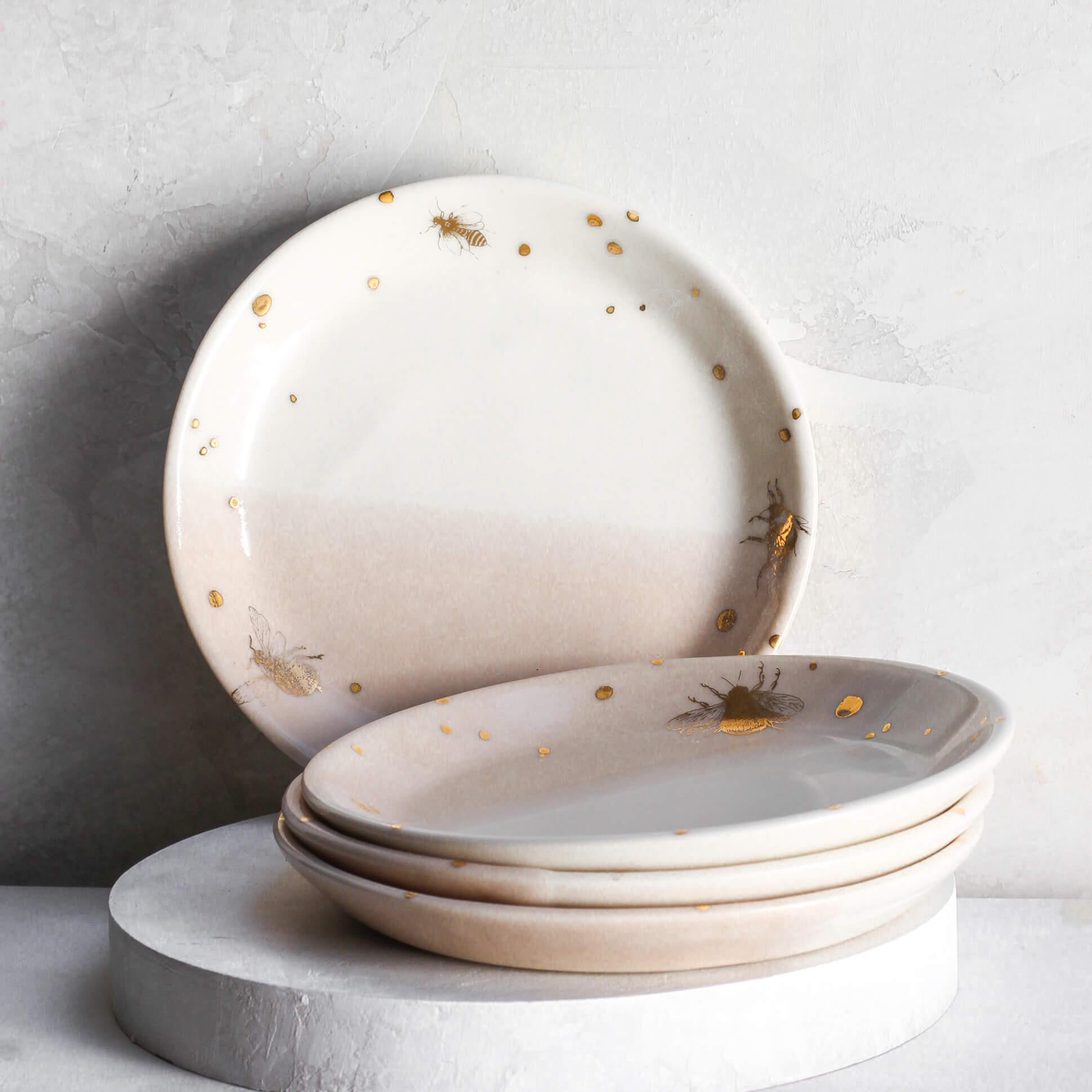 Stack of 4 Drops of Honey Bee dessert plates